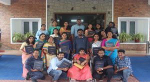 People holding their certificates